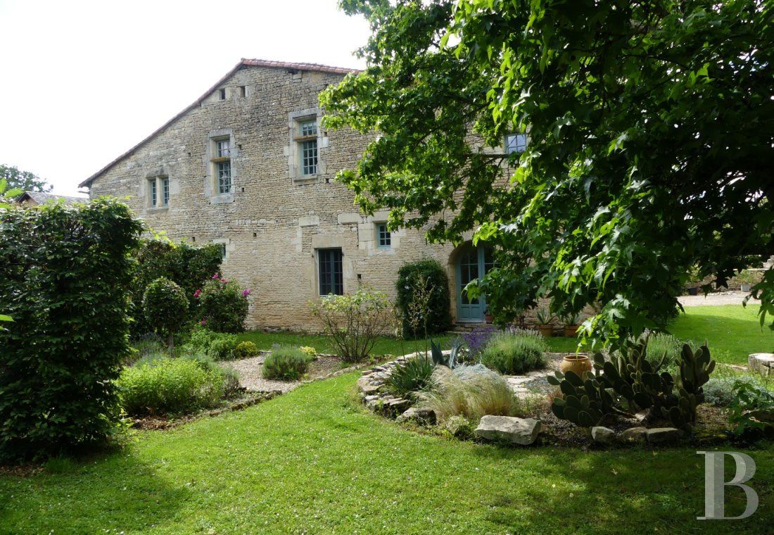 Character houses for sale - poitou-charentes - A dwelling, the faithful witness of the chateau that once preceded it,  nestled within a village in the Seuil du Poitou region